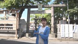 写真:神社でのリポート